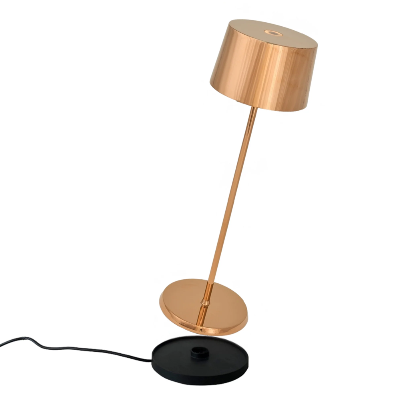 The rose gold Olivia Pro cordless lamp from Zafferano, a portable lamp.