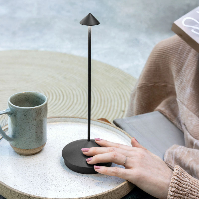 The dark gray Pina Pro from Zafferano in an outdoor lounge.