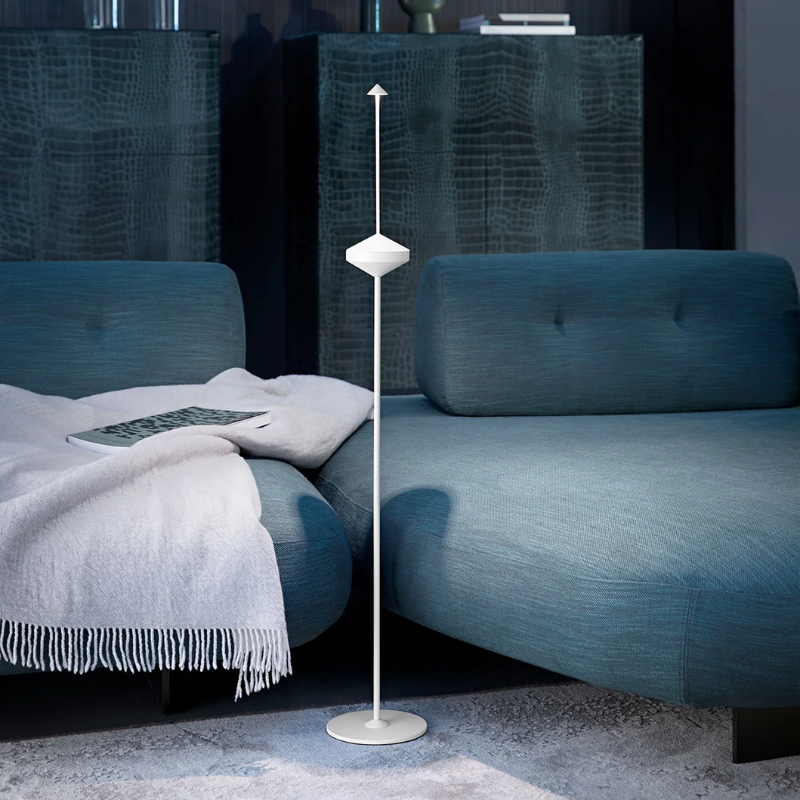 The white Pina Pro Floor Stand from Zafferano used in a the living room.