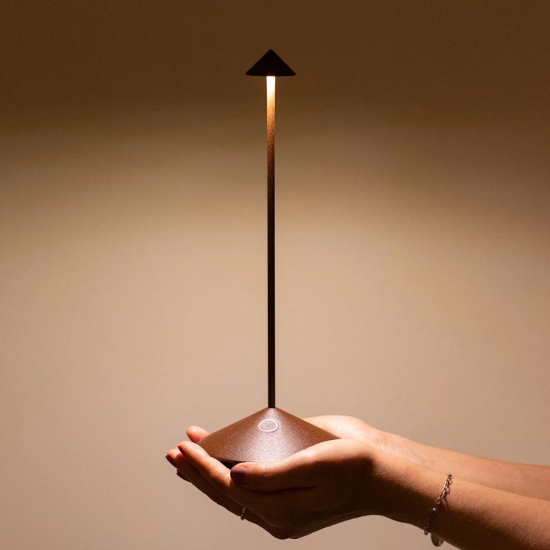 The rust Pina Pro from Zafferano, a cordless lamp.