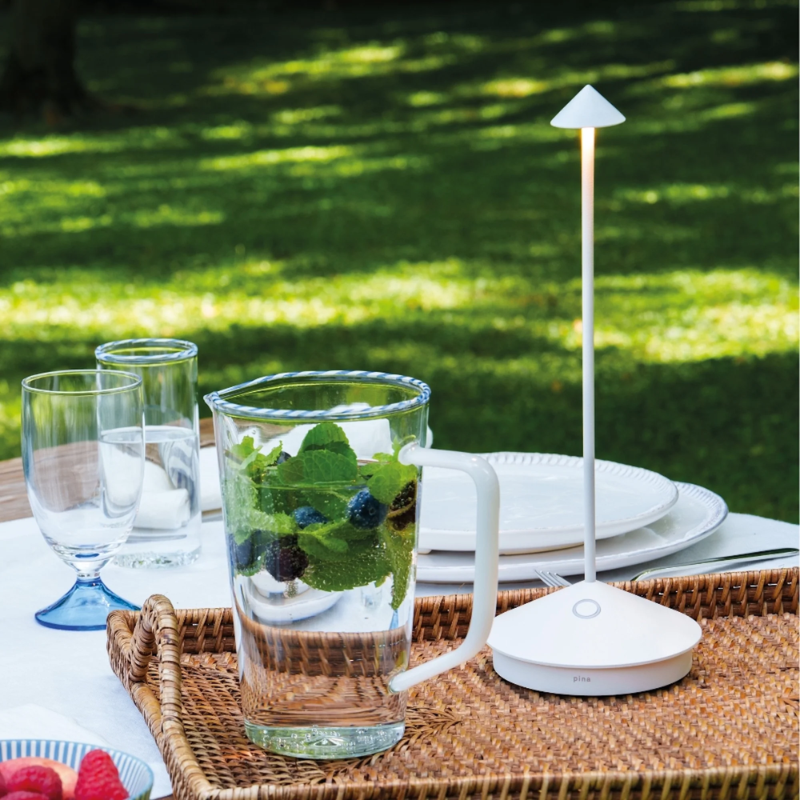 The white Pina Pro from Zafferano outdoors on a dining table.