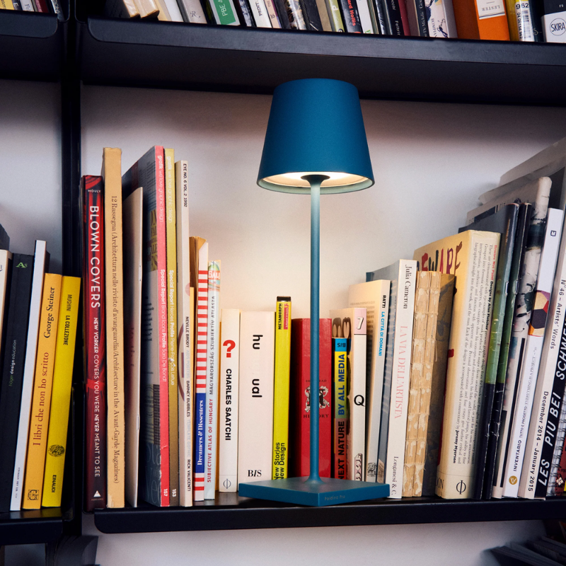 The avio blue Poldina Pro from Zafferano in a home library.