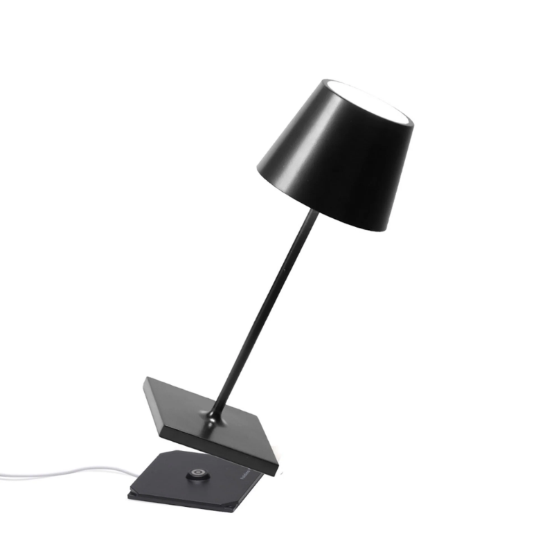 The black Poldina Pro Mini from Zafferano, a cordless lamp.