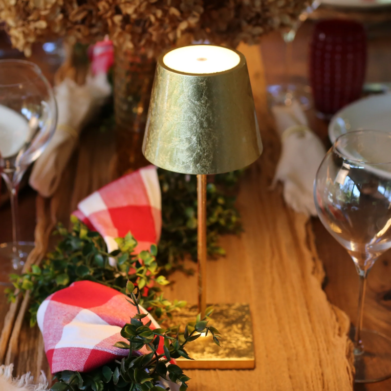 The gold leaf Poldina Pro Mini from Zafferano within a home interior.