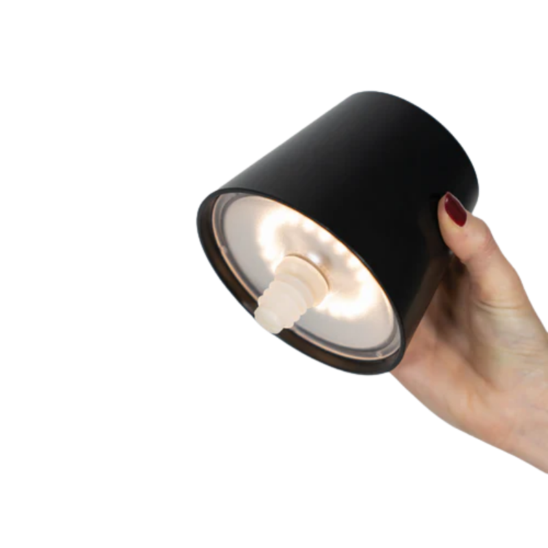 The black Poldina Pro Stopper from Zafferano being held.