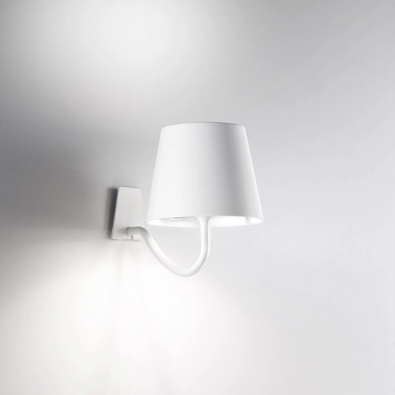 The white Poldina Pro Wall Magnetic with Mounting Bracket from Zafferano in a living space.