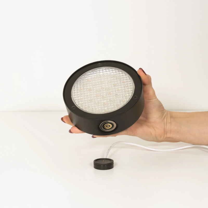 The black Super O Table Lamp from Zafferano light module.