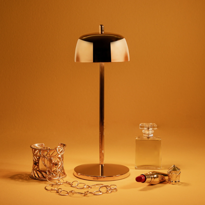 The polished gold Theta Pro from Zafferano in a family space.