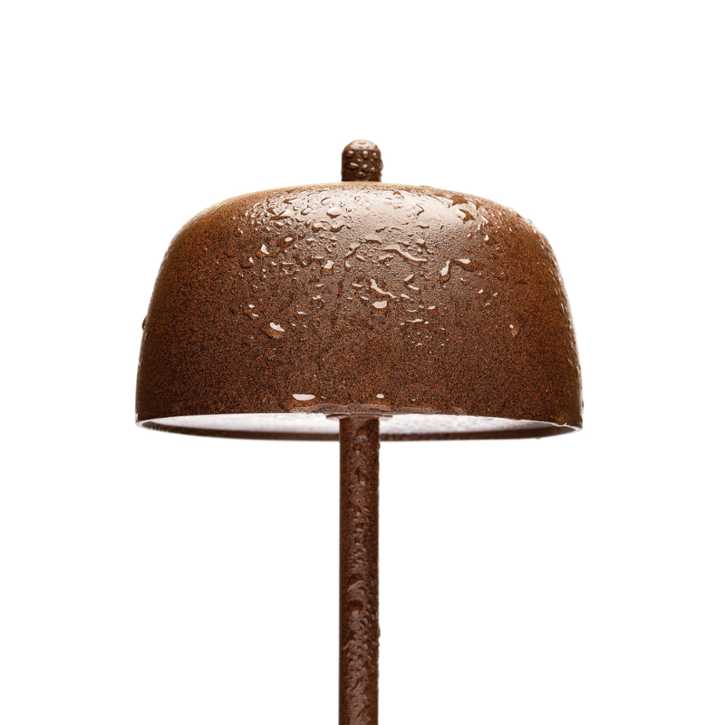 The rust Theta Pro from Zafferano showing it's water resistant features.