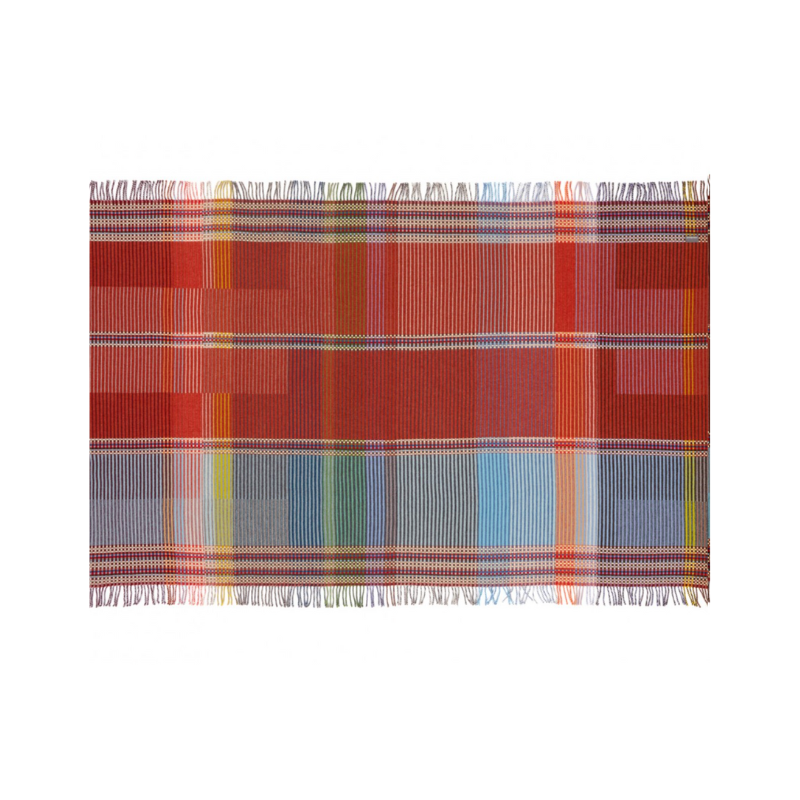 The Beatrix Throw by Wallace & Sewell is made of woven merino lambswool. The Pinstripe collection combines bold-colored blocks with fine, detailed vertical stripes. This double-sided design also has a contrasting pixelated border and is a stunning room addition