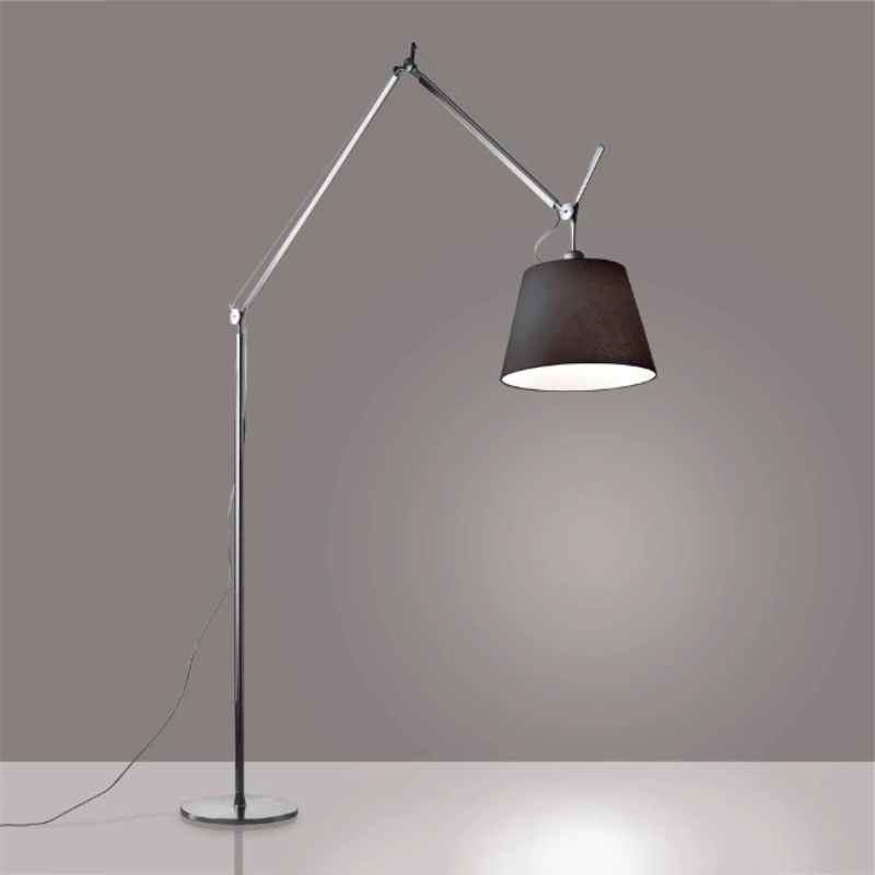 The Tolomeo Mega Floor Lamp, Black from Artemide in aluminum in a living room.