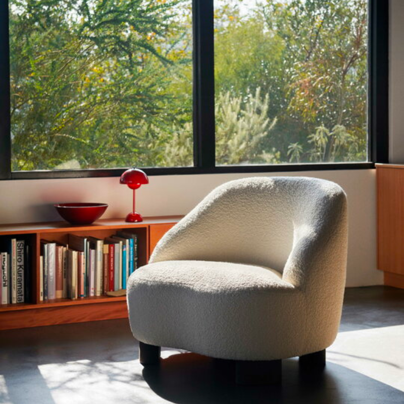 The Flowerpot VP9 Portable Table Lamp from &Tradition in a lounge.