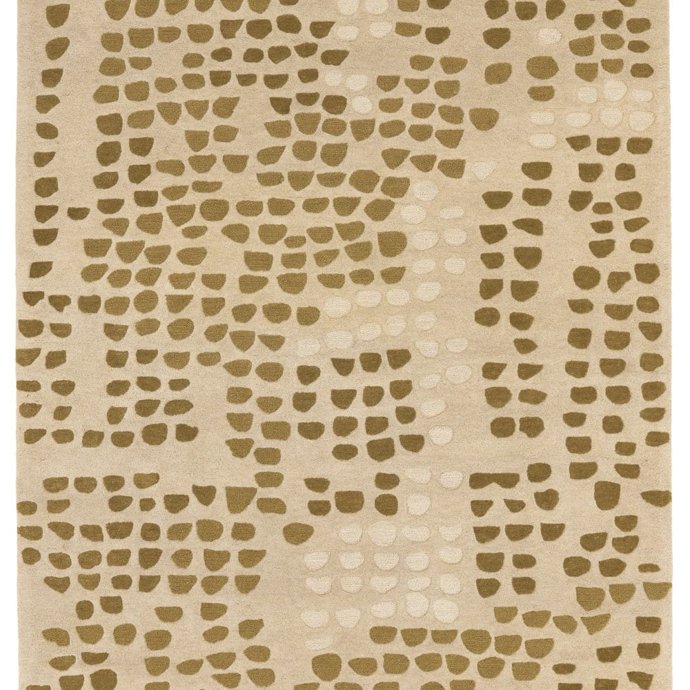 The Galets area rug by Toulemonde Bochart echoes the thought and nature of the Zen garden, the natural balance of fullness and emptiness takes place. A pebble path invites us to take a peaceful walk. The colors are mineral and the textures of wool play with their variations.
