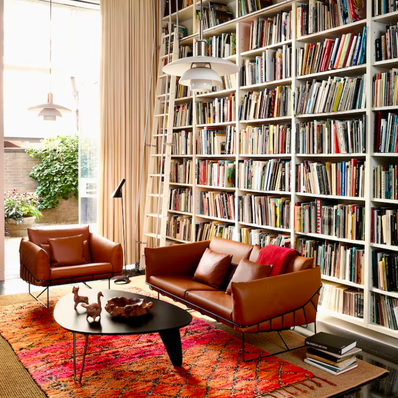 Balanced on two hairpin chrome legs and a single wooden "rudder," the wood top of the Noguchi Rudder Table (1949) seems to float airily in space. This wood and metal leg coffee table is available in three finishes and is an authentic Noguchi design created for Herman Miller.