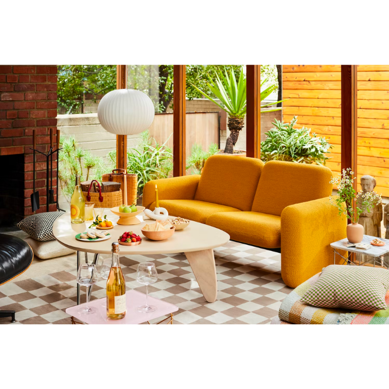 Balanced on two hairpin chrome legs and a single wooden "rudder," the wood top of the Noguchi Rudder Table (1949) seems to float airily in space. This wood and metal leg coffee table is available in three finishes and is an authentic Noguchi design created for Herman Miller.