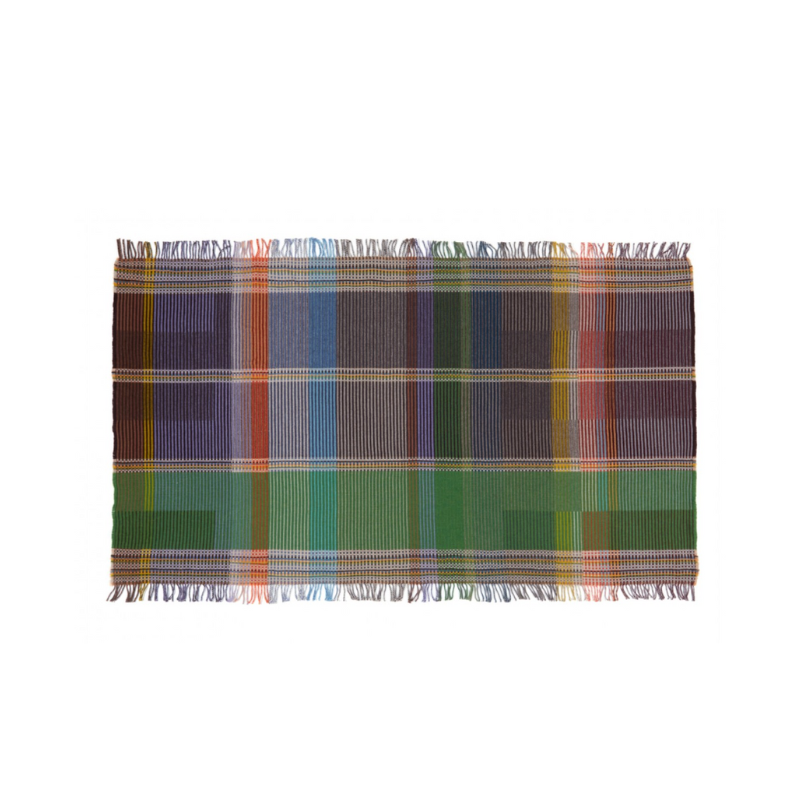 Woven in merino lambswool, Wallace & Sewell's Pinstripe throws combine bold-colored blocks with fine, detailed vertical stripes. This double-sided design also has a contrasting pixelated border and makes a stunning addition to a room.