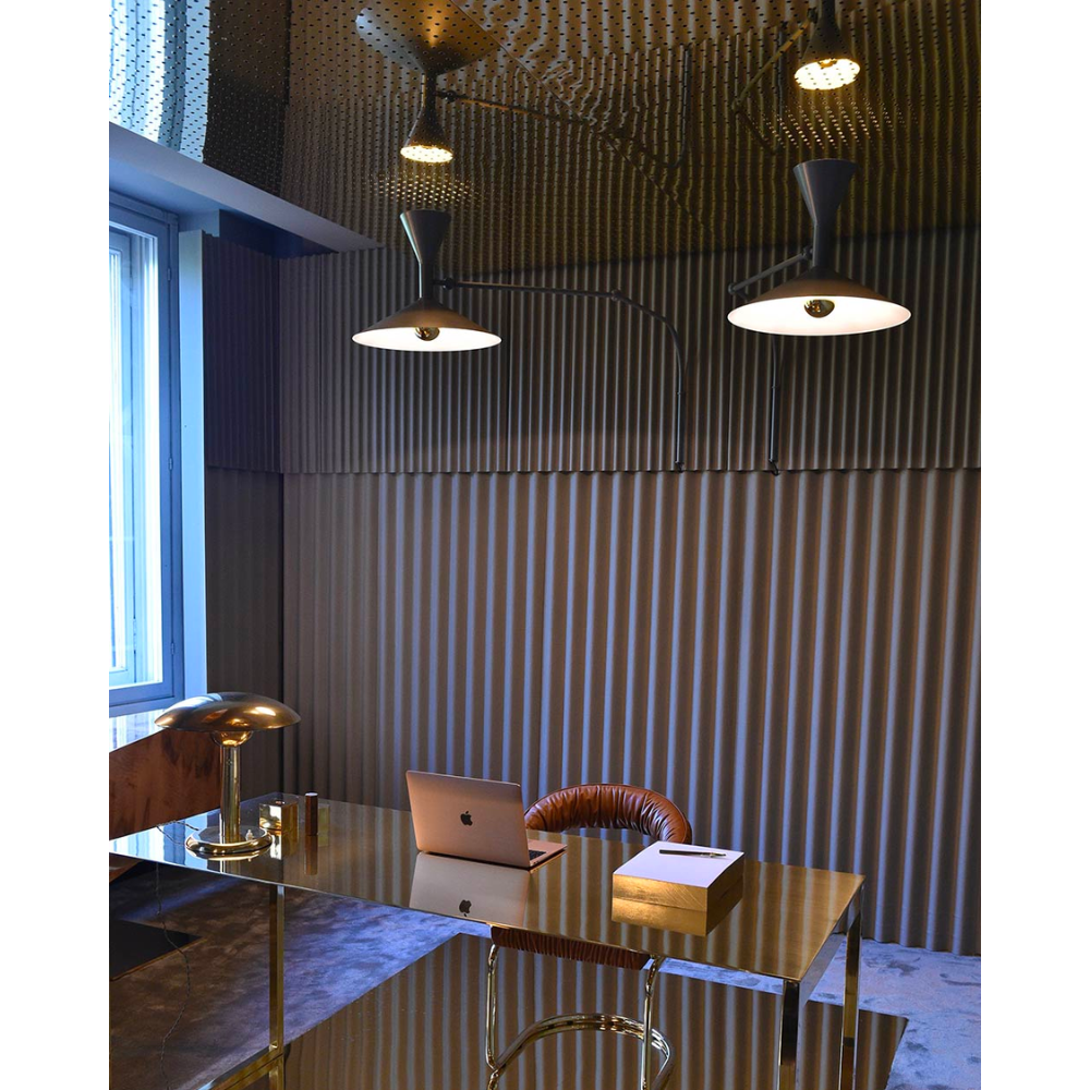 Designed by Le Corbusier for the Unité d Habitation of Marseille in 1949/1952, the Lampe de Marseille wall lamp from Nemo features adjustable lighting via its two joints on the arm with a refined aesthetic.