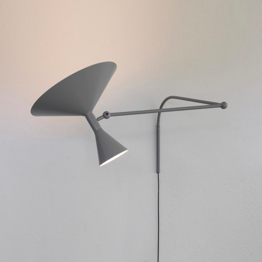 Designed by Le Corbusier for the Unité d Habitation of Marseille in 1949/1952, the Lampe de Marseille wall lamp from Nemo features adjustable lighting via its two joints on the arm with a refined aesthetic.