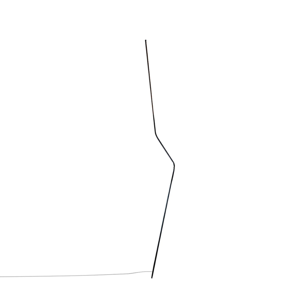 Make a statement or blend in, the NEO LED Floor Lamp, designed by Bernhard Ossan for Nemo, presents a refined fixture for modern spaces. Composed of a single steel beam, this fixture rests against the wall as a slender vertical structure.