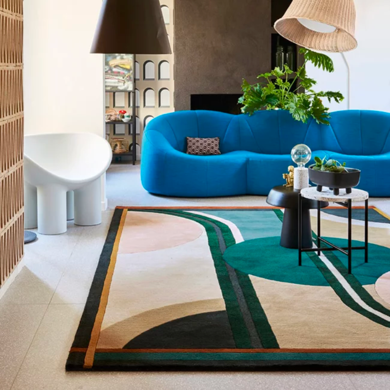 Tie together the aesthetic of your room while pleasing your feet with comfort as the Sonia Area Rug from Toulemonde Bochart sweeps across your floor. The shapes, color, and composition at play in this piece make it feel like you're looking at a modernist painting. Every element in this piece is balanced. Its playful, sophisticated personality is heightened by a 100% wool construction. The hand-tufted piece introduces tightly packed loops that feel nice to sit or stand on.