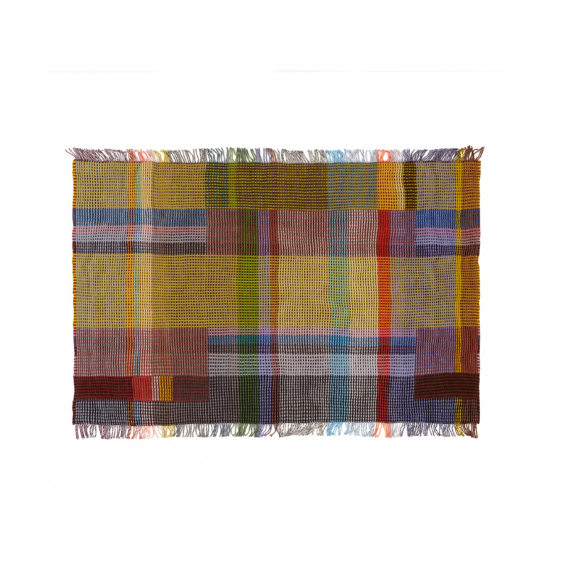 The Edith Honeycomb Throw from Wallace & Sewell made from 100% merino lambswool in the United Kingdom.