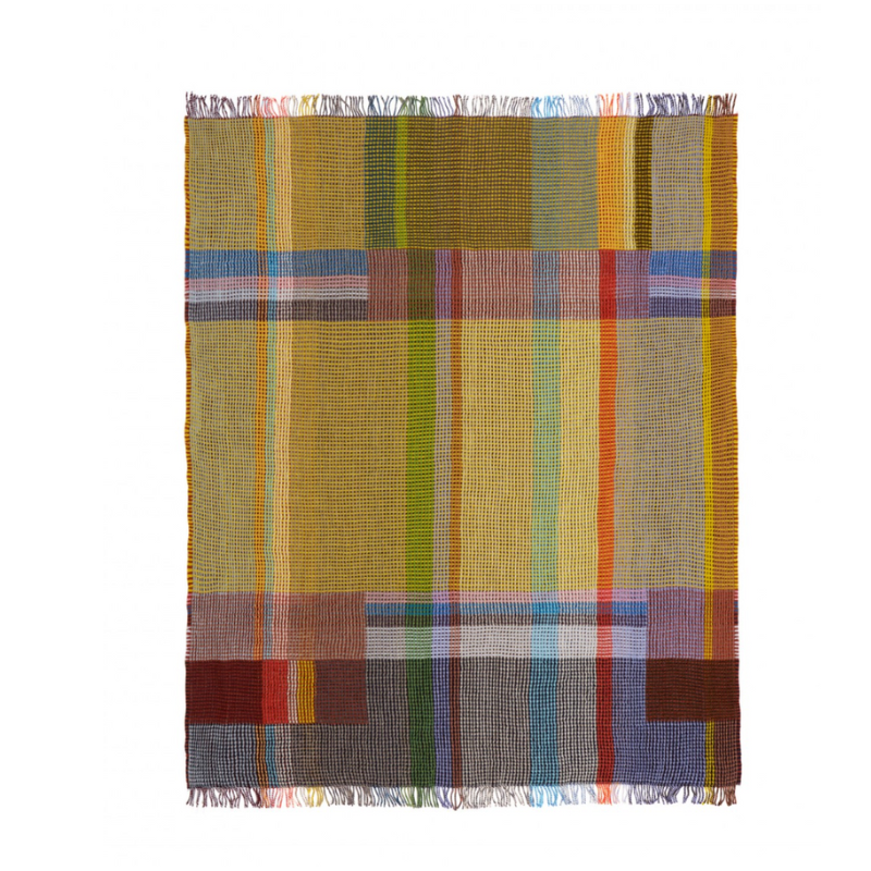 The Edith Honeycomb Throw from Wallace & Sewell made from 100% merino lambswool in the United Kingdom.
