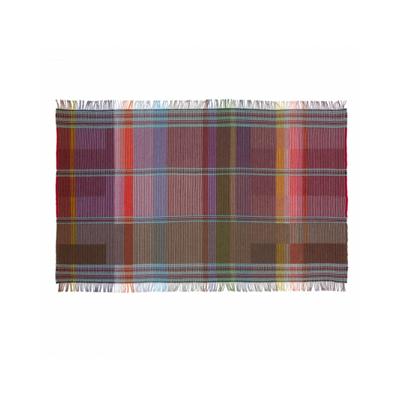 Woven in merino lambswool, Wallace & Sewell's Pinstripe throws combine bold-colored blocks with fine, detailed vertical stripes. This double-sided design also has a contrasting pixelated border and makes a stunning addition to a room.