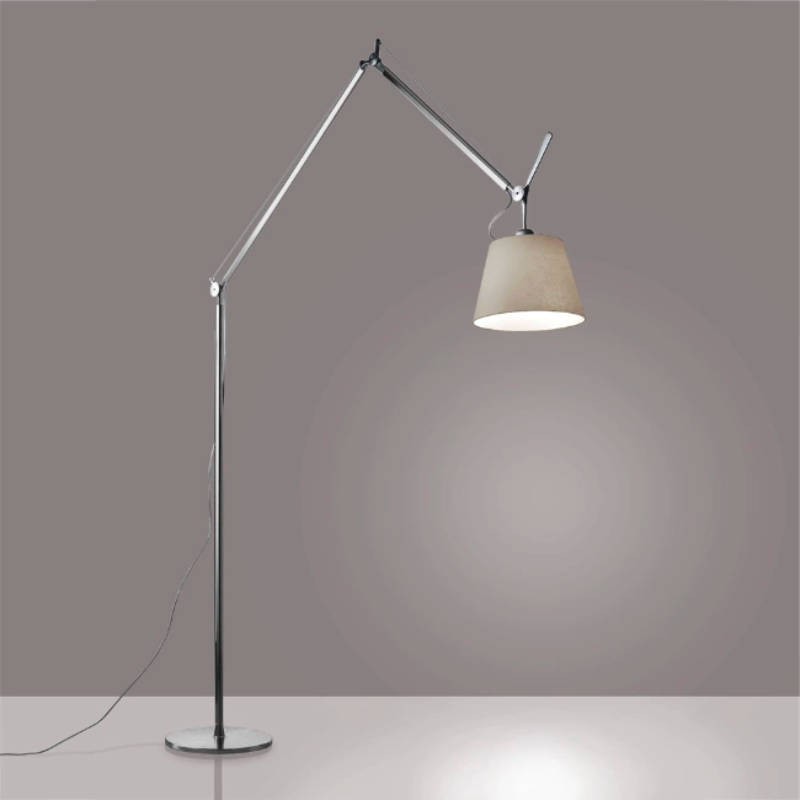 The Tolomeo Mega Floor Lamp from Artemide in parchment with a 12-inch shade in a living room.