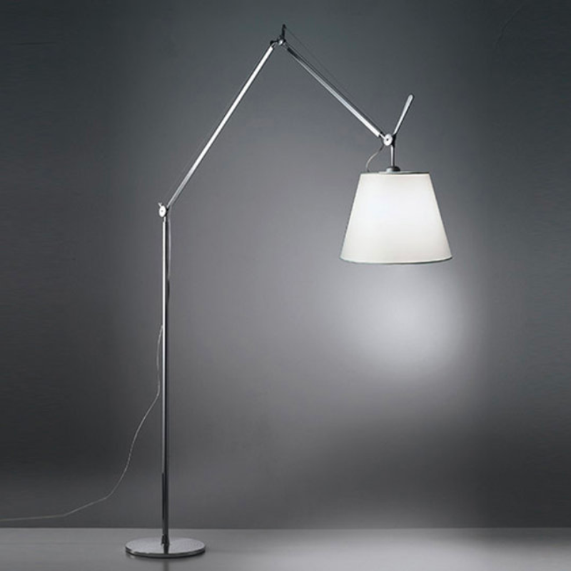 The Tolomeo Mega Floor Lamp from Artemide in parchment with a 17-inch shade in a family space.