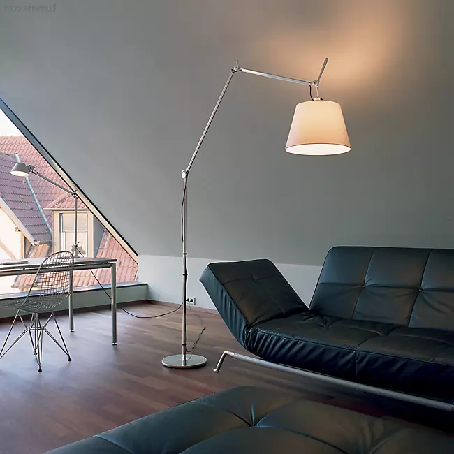 The Tolomeo Mega Floor Lamp from Artemide in parchment with a 17-inch shade in a lounge.
