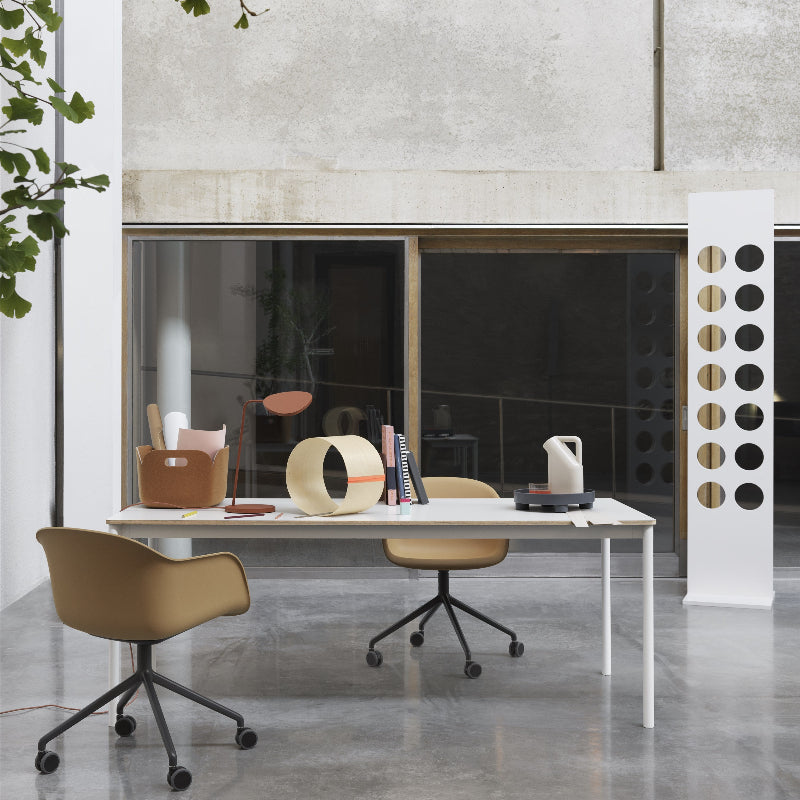 The Platform Tray by Muuto in blue gra in a family area.
