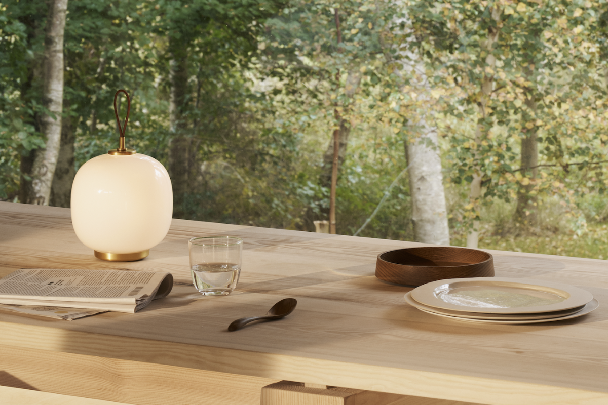 Louis Poulsen's VL 45 Radiohus Pendant on a dining table