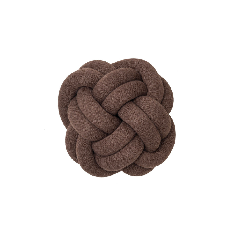 The versatile Knot Seat Cushion, Medium is a unique floor cushion that doubles as an ottoman, extra seating, or a decorative element in any living space. Crafted with a sculptural form instead of traditional patterns, this cushion is unlike anything you've seen. 