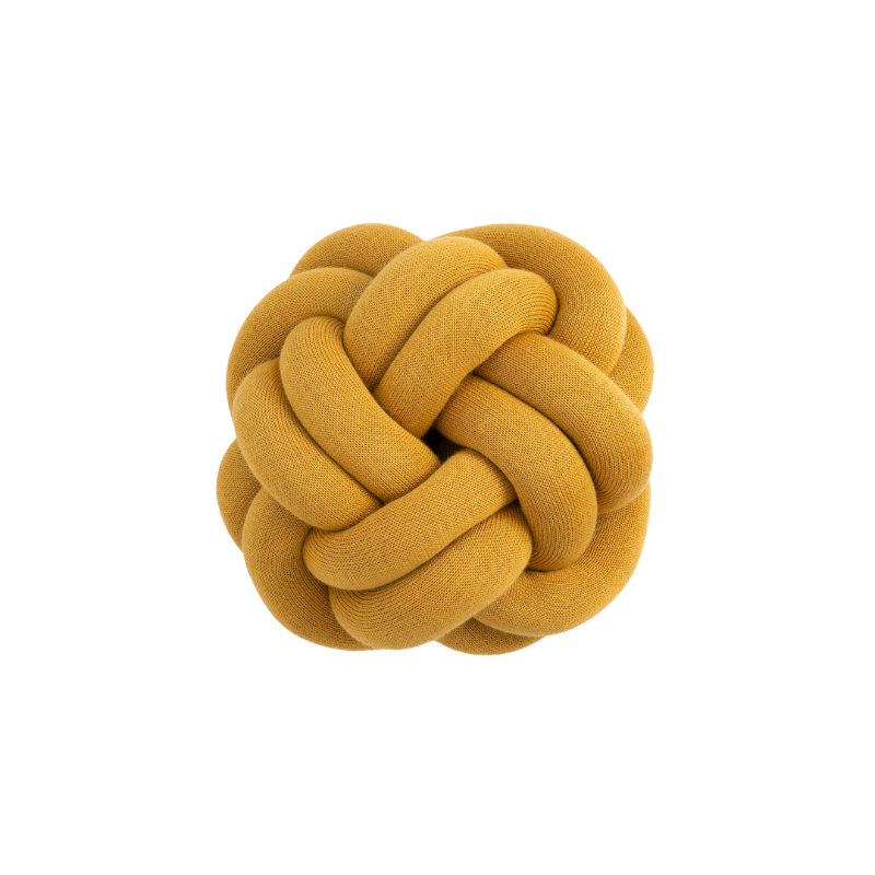 The versatile Knot Seat Cushion, Medium is a unique floor cushion that doubles as an ottoman, extra seating, or a decorative element in any living space. Crafted with a sculptural form instead of traditional patterns, this cushion is unlike anything you've seen. 