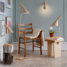 The AJ Wall from Louis Poulsen in a living room. 