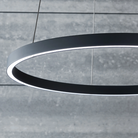 The Fiama Suspension Light from Visual Comfort and Co. in a family space.