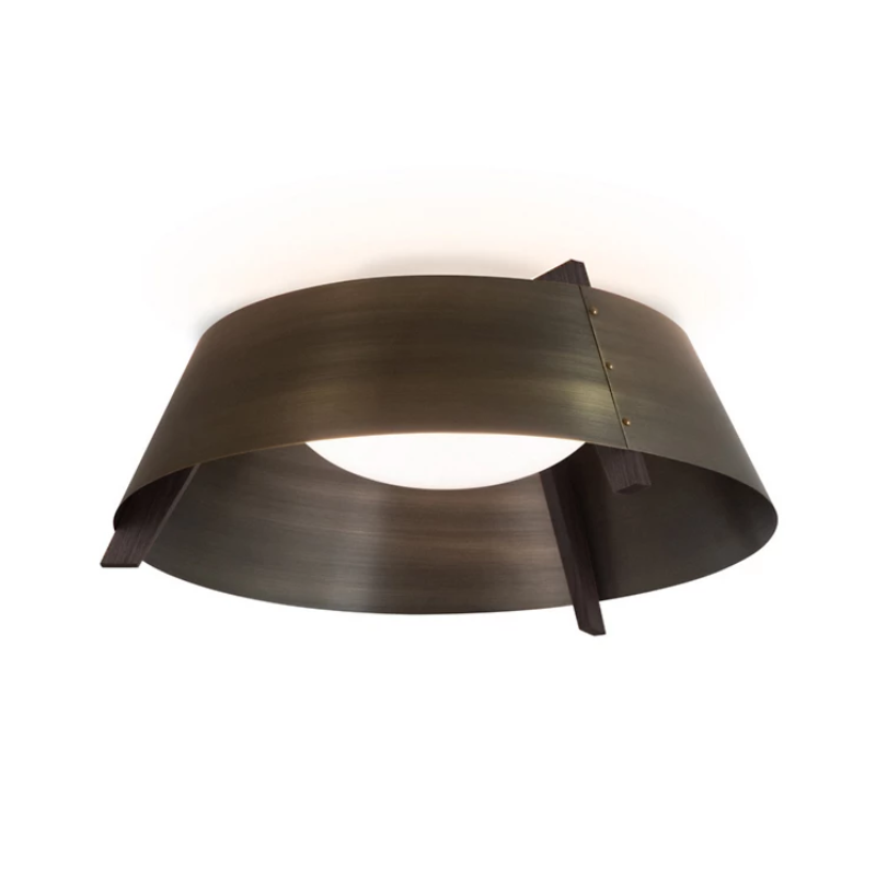 The Casia Flush Mount from Cerno with the distressed brass shade and dark stained walnut frame.