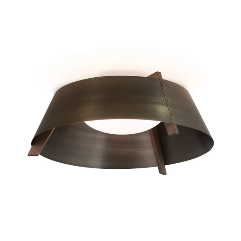 The Casia Flush Mount from Cerno with the distressed brass shade and walnut frame.