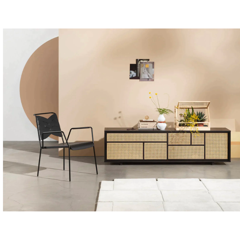 The Air Sideboard, Low by Design House Stockholm boasts a graphic pattern of rattan made of natural cane inlays, giving a feeling of lightness and transparency. The Air Sideboard can be used as a freestanding room divider or placed against a wall as a TV stand.