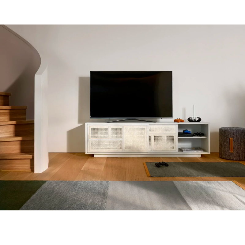 The Air Sideboard, Low by Design House Stockholm boasts a graphic pattern of rattan made of natural cane inlays, giving a feeling of lightness and transparency. The Air Sideboard can be used as a freestanding room divider or placed against a wall as a TV stand.