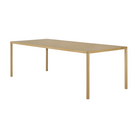 The Air Dining Table from Ethnicraft in the 94 inch size from a side angle.
