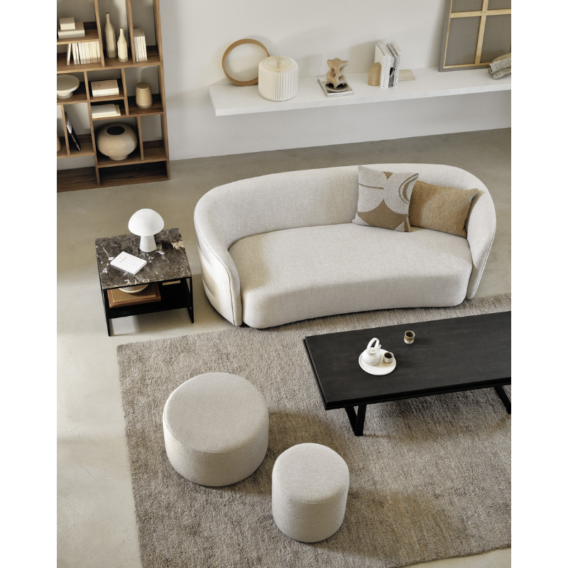 The Barrow Pouf in Off White Color is a cozy complement to any living space. Made with Italian fabrics in a range of hues, the Barrow pouf creates a relaxed atmosphere while doubling as additional seating for an indoor gathering. This easy-to-style item was designed by Jacques Deneef.