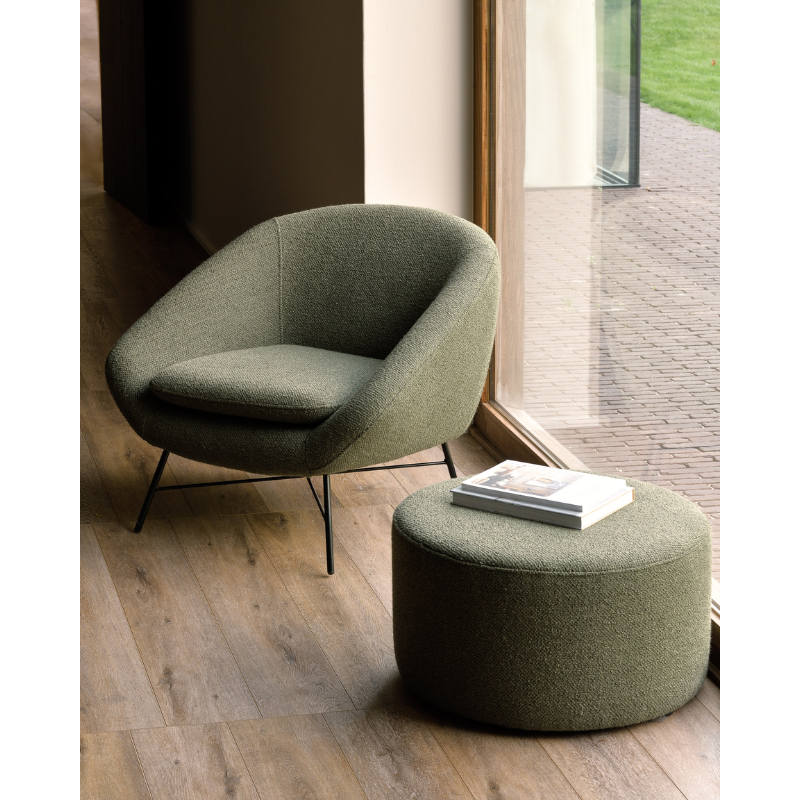 The Barrow Pouf by Ethnicraft paired with the Barrow Lounge Chair within a living room lifestyle shot.