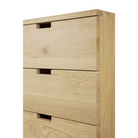 The Billy Drawer Unit from Ethnicraft in oak with a close up on the draw handles.