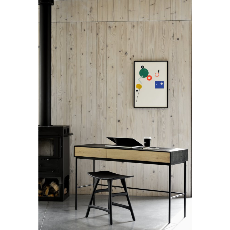The Blackbird Desk from Ethnicraft in a home office lifestyle photograph.