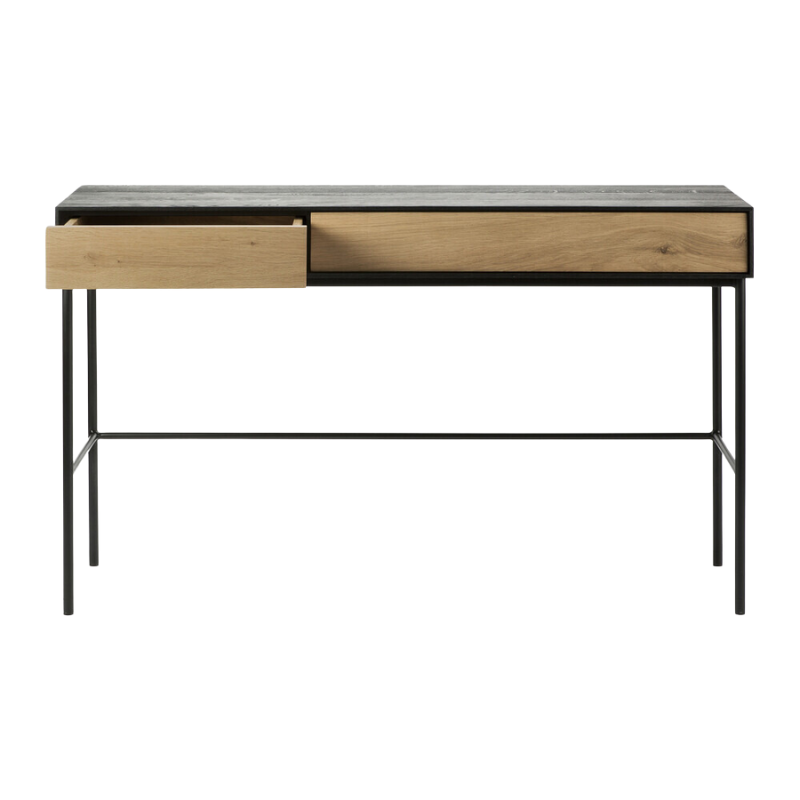 The Blackbird Desk from Ethnicraft with an opened drawer.