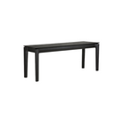 The Bok Bench from Ethnicraft in the black oak finish and 65.5 inch length from a side angle.