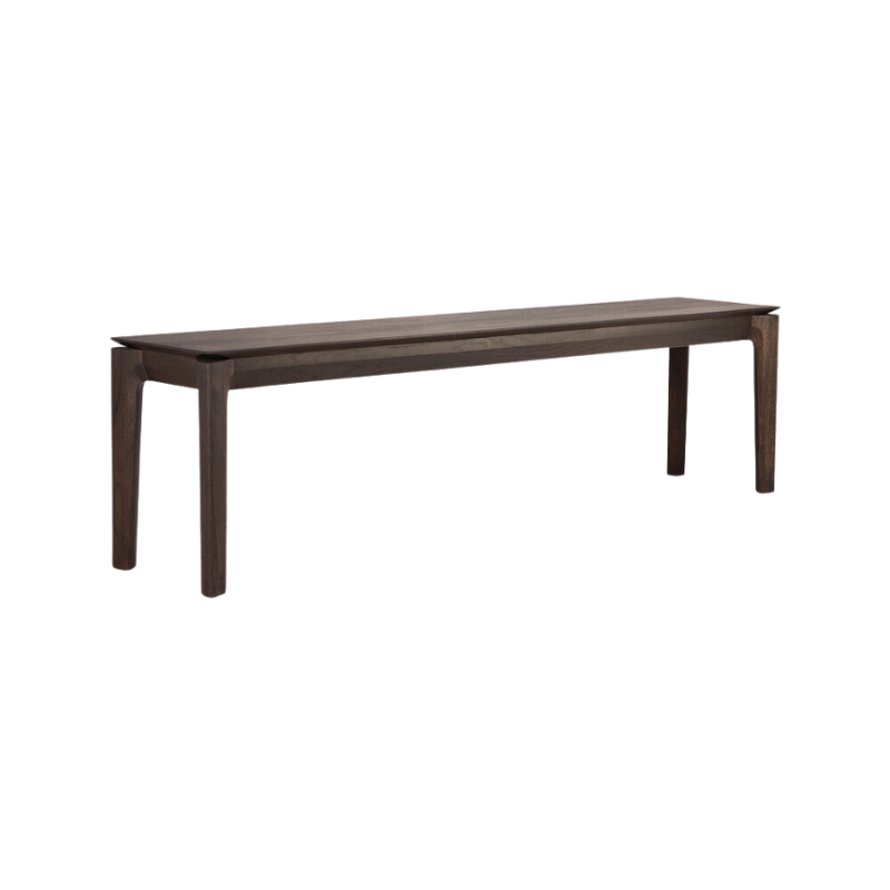 The Bok Bench from Ethnicraft in the brown oak finish and 65.5 inch length from a side angle.