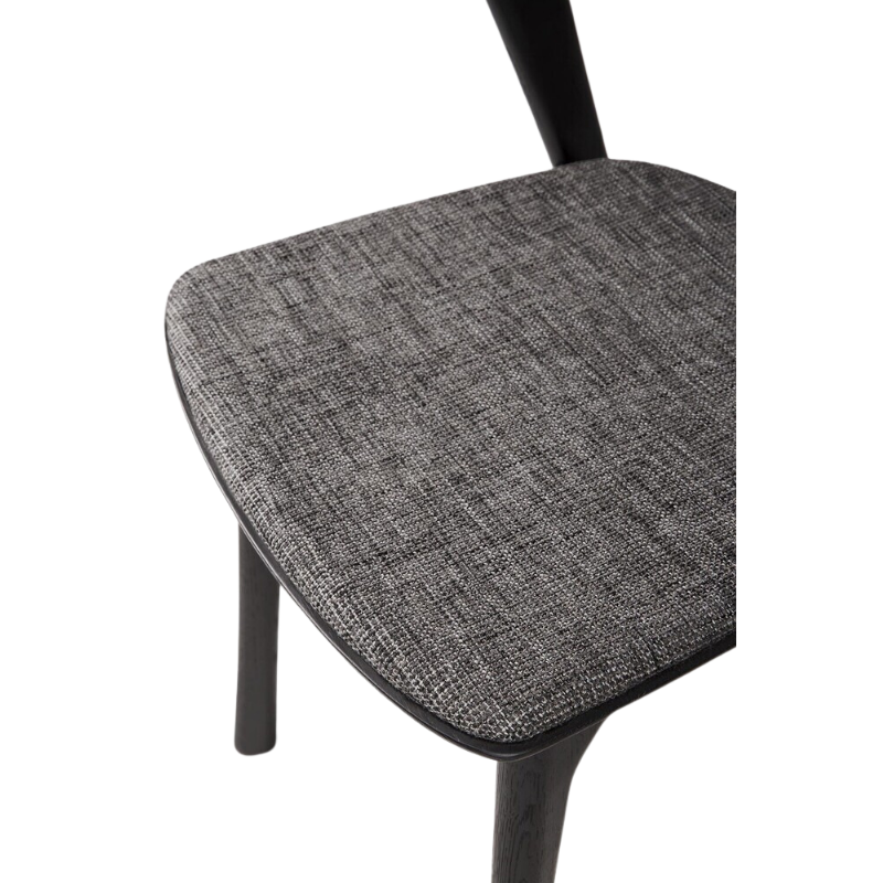 The Bok Dining Chair from Ethnicraft in black oak with grey  upholstery.