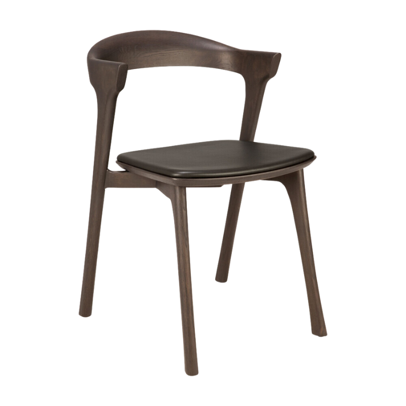 The Bok Dining Chair from Ethnicraft in brown oak with brown leather upholstery.